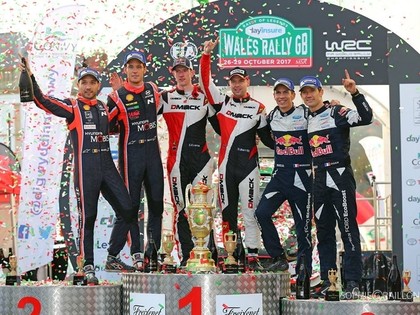 Evans izcīna pirmo uzvaru WRC, Ožjē kļūst par pieckārtējo čempionu